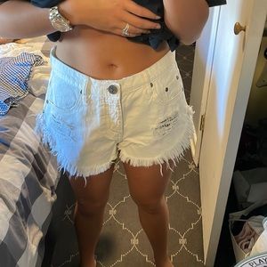 On teaspoon white shorts